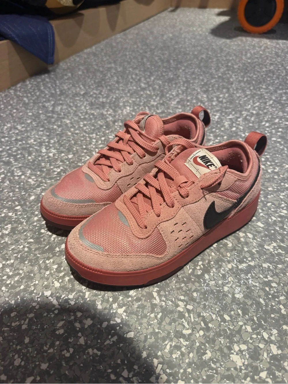 Nike Women's Rose Pink Low-Top Sneakers with Black Swoosh